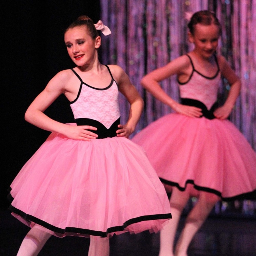 Pink tutu with lace detailing and black trim